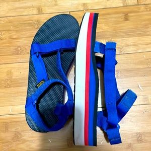Red white and blue Teva flatforms